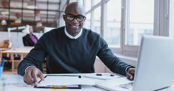 Businessman Sitting at a Desk